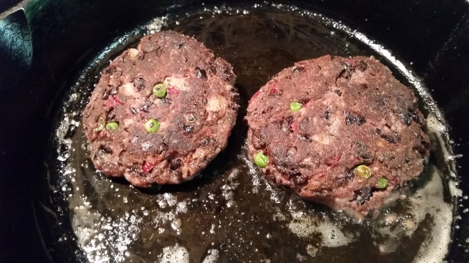 burgers sizzling