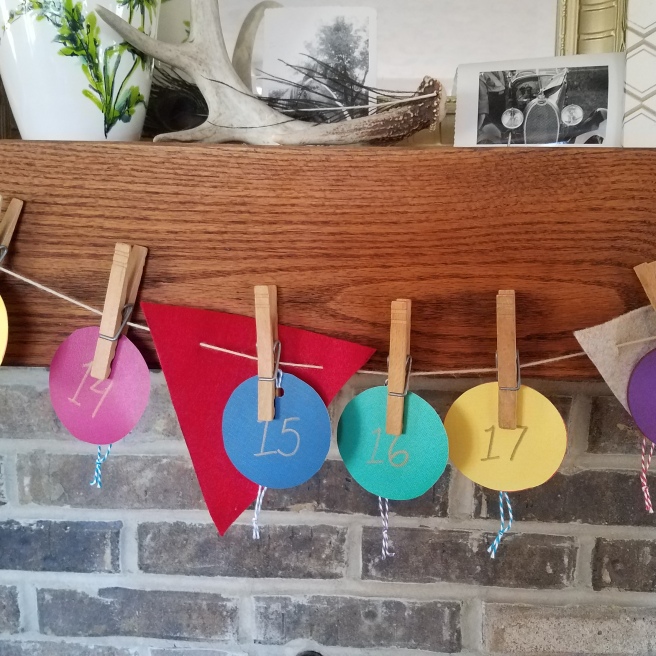 String paper ornaments across your mantel using clothespins